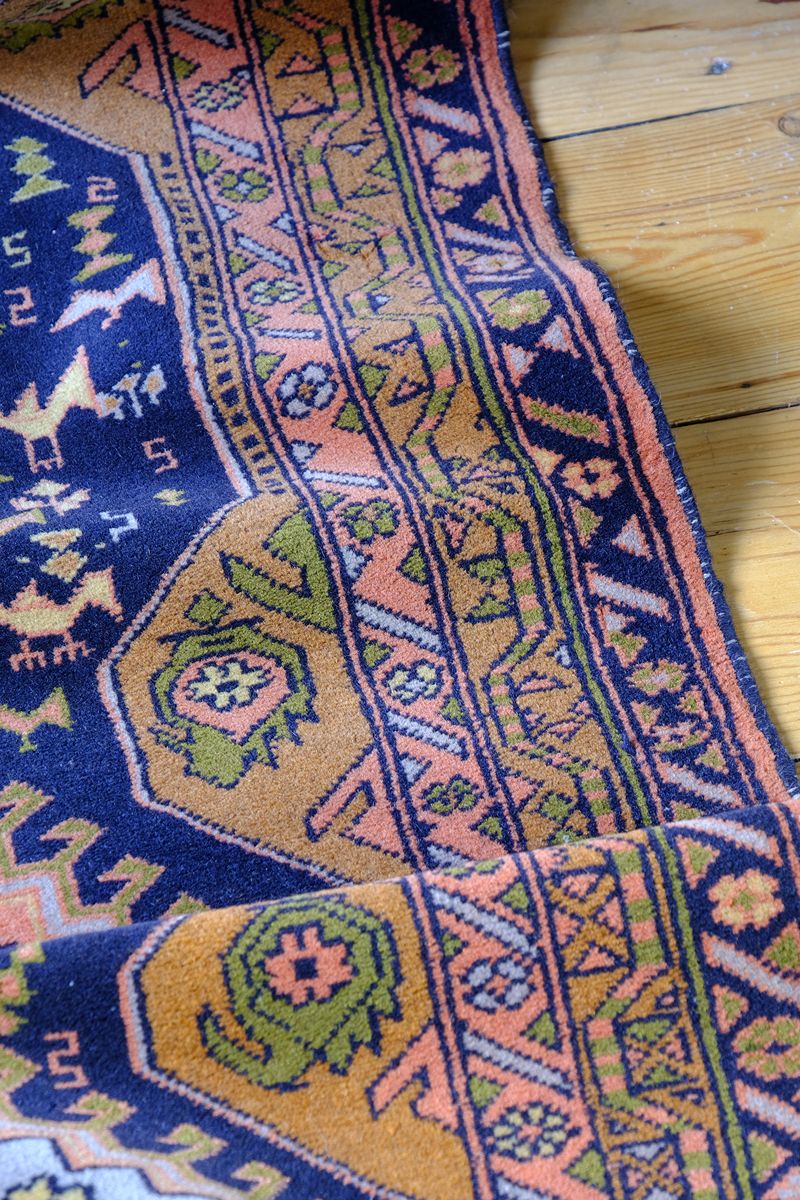 An Antique North-West Persian Village Hall Runner often tells a far richer story than its first impression suggests
