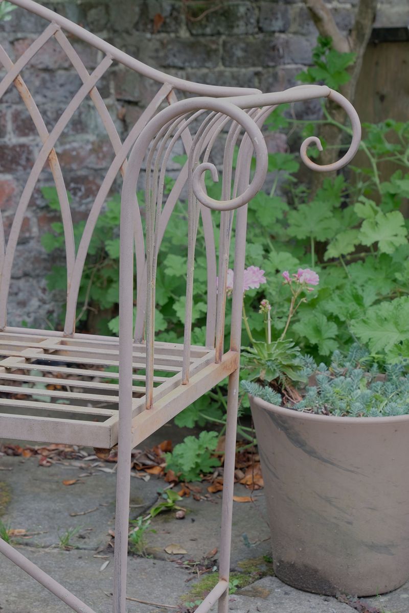 Wrought Iron Garden Bench: Gothic Arches and a Place to Pause